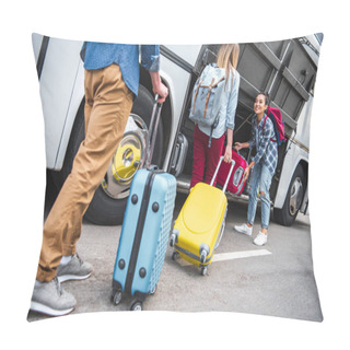 Personality  Selective Focus Of Smiling Woman Putting Wheeled Bag Into Travel Bus While Her Friends Walking Near At Urban Street  Pillow Covers