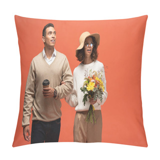 Personality  Shocked Interracial Couple In Autumn Outfit With Coffee To Go And Bouquet Of Flowers Isolated On Orange Pillow Covers