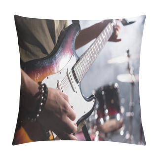 Personality  KYIV, UKRAINE - AUGUST 25, 2020: Cropped View Of Rock Band Guitarist Holding Guitar Pick Near Strings On Blurred Background Pillow Covers