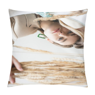 Personality  Top View Of Upset Young Woman Looking At Camera Near Barley Spikelets On White Pillow Covers