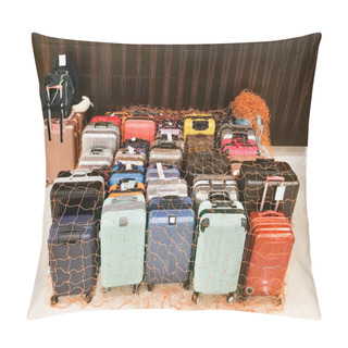 Personality  Luggage Bags At Hotel Concierge Isolated And Secured With Netting Pillow Covers