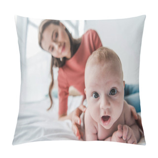Personality  Selective Focus Cute Infant Baby Looking At Camera Near Happy Mother In Bedroom  Pillow Covers