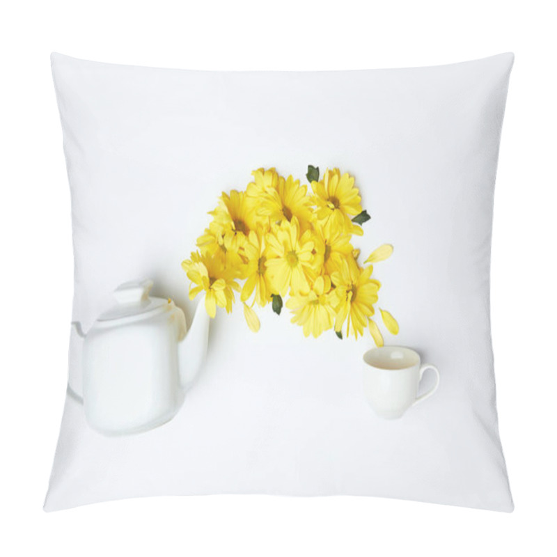 Personality  Pouring yellow chrysanthemums from white teapot into cup isolated on white pillow covers