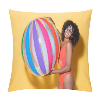 Personality Joyful African American Woman In Swimsuit And Trendy Sunglasses Holding Striped Inflatable Ball On Yellow Background Pillow Covers