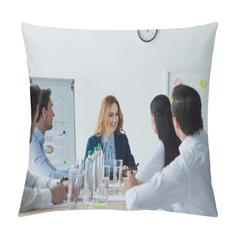 Personality  partial view of business colleagues having discussion at workplace in office pillow covers