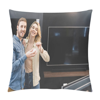 Personality  Smiling Boyfriend Holding Piggy Bank And Girlfriend Putting Coin Into It In Home Appliance Store  Pillow Covers