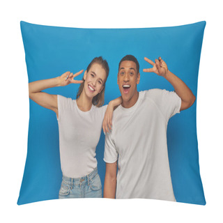 Personality  Happy Multicultural Couple Showing Peace Sign And Looking At Camera On Blue Background, Positivity Pillow Covers