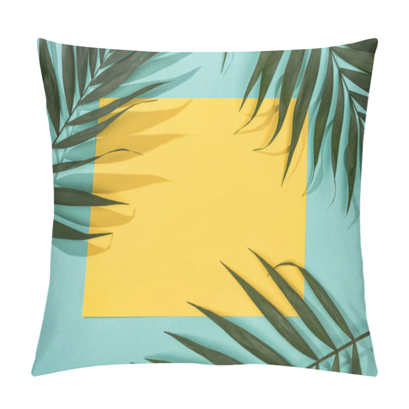 Personality  top view of tropical leaves and yellow card with copy space on turquoise background pillow covers