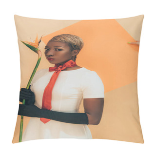 Personality  Fashion Shoot With African American Woman In Black Gloves Holding Strelitzia Flower On Beige And Orange Pillow Covers