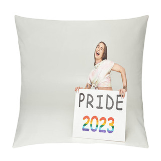 Personality  Excited Young Gay Activist With Tattoo And Long Hair Standing With Opened Mouth And Holding Pride 2023 Placard On Grey Background, Lgbt Community Holiday In June  Pillow Covers