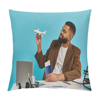 Personality  A Man Sits At A Desk, Holding A Model Airplane, Deep In Thought. He Carefully Examines And Works On The Intricate Details Of The Small Aircraft. Pillow Covers