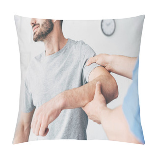 Personality  Selective Focus Of Patient Suffering From Pain And Doctor Examining Patient Arm In Massage Cabinet At Clinic Pillow Covers