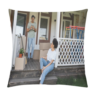 Personality  Happy African American Man Holding Coffee To Go Near Girlfriend And Boxes On Porch Of New House Pillow Covers