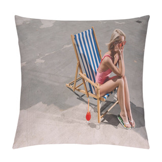 Personality  High Angle View Of Happy Young Woman Sitting In Sun Lounger On Asphalt Pillow Covers