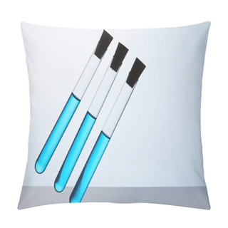 Personality  Row Of Test Tubes Filled With Blue Liquid On Grey Pillow Covers