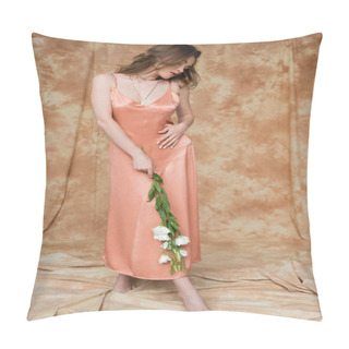 Personality  Full Length Of Sensual Young Woman In Pink Silk Slip Dress Holding White Flowers While Standing On Mottled Beige Background, Graceful, Elegance, Looking Down, Barefoot  Pillow Covers