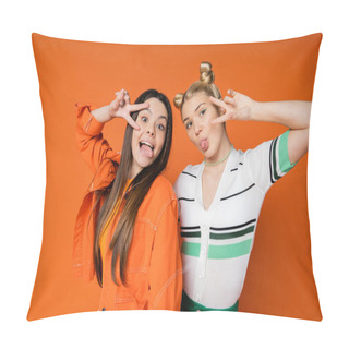 Personality  Portrait Of Trendy Teenage Girlfriends With Bright Makeup Sticking Out Tongues And Showing Peace Gesture At Camera While Standing Isolated On Orange, Fashionable Girls With Sense Of Style Pillow Covers