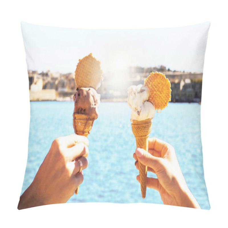 Personality  a girl and a boy young couple is holding melting ice cream in waffle  cone under blue sky with bright blue sea on the background in hot summer day on a vacation , holiday pillow covers