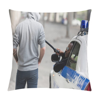 Personality  Rear View Of African American Policeman Stopping Hooded Man With Police Bat While Looking Out Window Pillow Covers