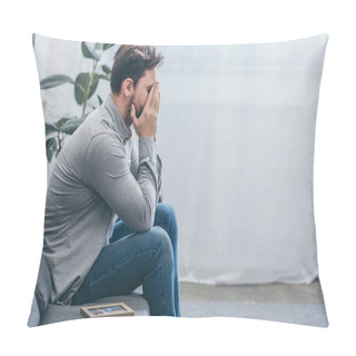 Personality  Man Sitting On Grey Couch With Photo In Frame And Crying At Home, Grieving Disorder Concept Pillow Covers
