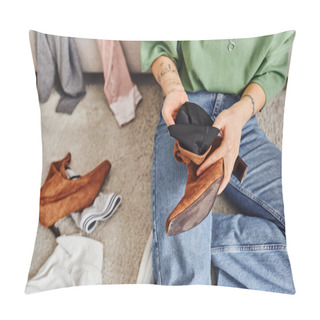 Personality  Partial View Of Young Woman With Tattoo Sitting On Floor In Living Room And Holding Suede Boot While Decluttering Clothes At Home, Top View, Sustainable Living And Mindful Consumerism Concept Pillow Covers