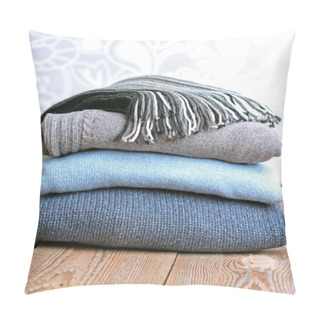 Personality  Pile Of Warm Wool Clothing On A Wooden Table Pillow Covers