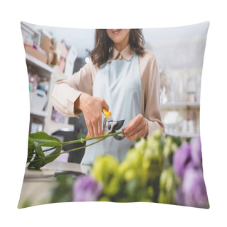 Personality  Partial View Of Cheerful Florist Cutting Steam Near Flowers Of Blurred Foreground Pillow Covers