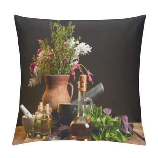 Personality  Clay Vase With Fresh Herbs And Flowers Near Mortar And Pestle And Bottles On Wooden Table Isolated On Black Pillow Covers