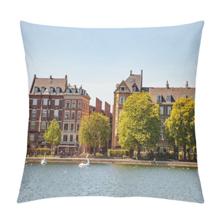 Personality  COPENHAGEN, DENMARK - MAY 6, 2018: Catamarans Shaped Of Swans On River In Front Of Buildings  Pillow Covers