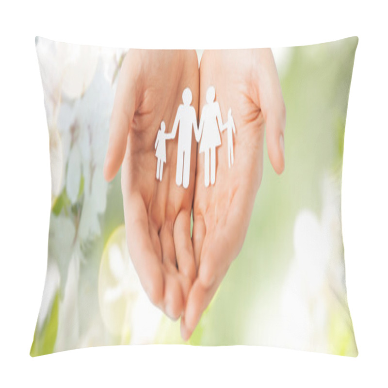 Personality  man hands holding paper cutout of family pillow covers