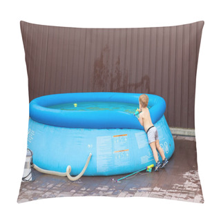 Personality  Cute Little Adorable Caucasian Blond Toddler Boy Looking Into Inflatable Blue Pool Enjoy Playing With Toy Fishing Rod At Home Yard On Hot Summer Day. One Kid Playing Alone Near Poolside At Backyard Pillow Covers