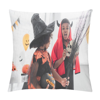 Personality  Spooky African American Boy In Halloween Costume Holding Skull Near Sister With Broom And Carved Pumpkin  Pillow Covers