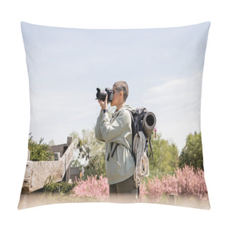 Personality  Side View Of Young Short Haired And Tattooed Hiker With Backpack Taking Photo On Digital Camera While Standing Near Wooden Fence And Scenic Landscape, Travel Photographer Pillow Covers