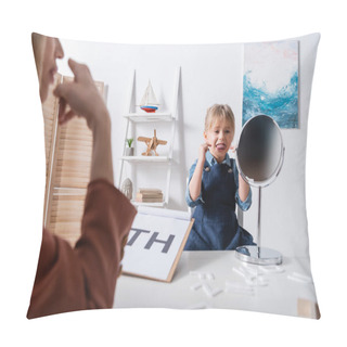 Personality  Pupil Sticking Out Tongue And Pointing With Fingers While Talking Near Mirror And Blurred Speech Therapist In Classroom  Pillow Covers