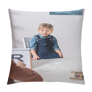 Personality  Smiling Kid Talking Near Blurred Speech Therapist Pointing At Letter On Clipboard In Classroom  Pillow Covers