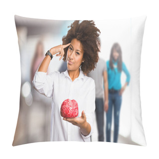 Personality  Young Black Woman Holding A Brain Shape With Blurred People In Background Pillow Covers