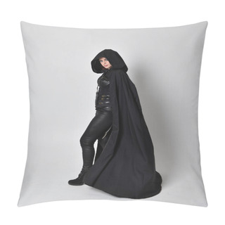 Personality  Fantasy Portrait Of A Woman With Red Hair Wearing Dark Leather Assassin Costume With Long Black Cloak. Full Length Standing Pose In Side Profile Isolated Against A Studio Background. Pillow Covers