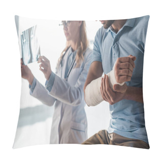 Personality  Selective Focus Of Injured Man Near Attractive Doctor Looking At X-ray  Pillow Covers