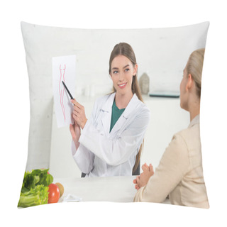 Personality  Smiling Dietitian In White Coat Showing Paper With Perfect Body Image To Patient  Pillow Covers