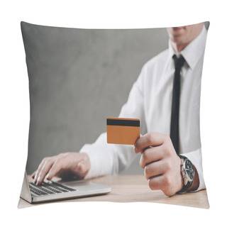 Personality  Cropped Shot Of Businessman Holding Credit Card And Using Laptop Pillow Covers