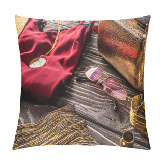 Personality  Close Up View Of Arrangement Of Golden And Red Fashionable Feminine Accessories And Clothing On Wooden Surface Pillow Covers