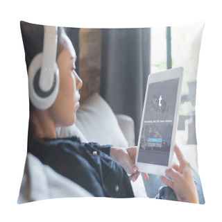 Personality  KYIV, UKRAINE - APRIL 29, 2020: Selective Focus Of Girl In Wireless Headphones Listening Music And Using Digital Tablet With Tumblr App  Pillow Covers