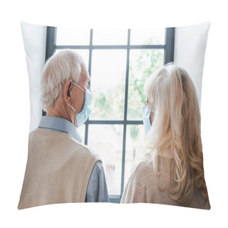 Personality  Back View Of Sad Elderly Couple In Medical Masks Looking Through Window During Self Isolation Pillow Covers