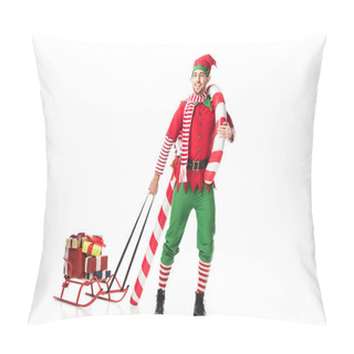 Personality  Happy Man In Christmas Elf Costume Carrying Sleigh With Presents And Big Candy Cane Isolated On White Pillow Covers