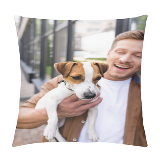 Personality  Selective Focus Of Young Man Holding Jack Russell Terrier Dog On Street Pillow Covers