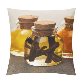 Personality  Glass Bottles Of Essential Oil With Vanilla And Cut Fruits On Dark Surface Pillow Covers