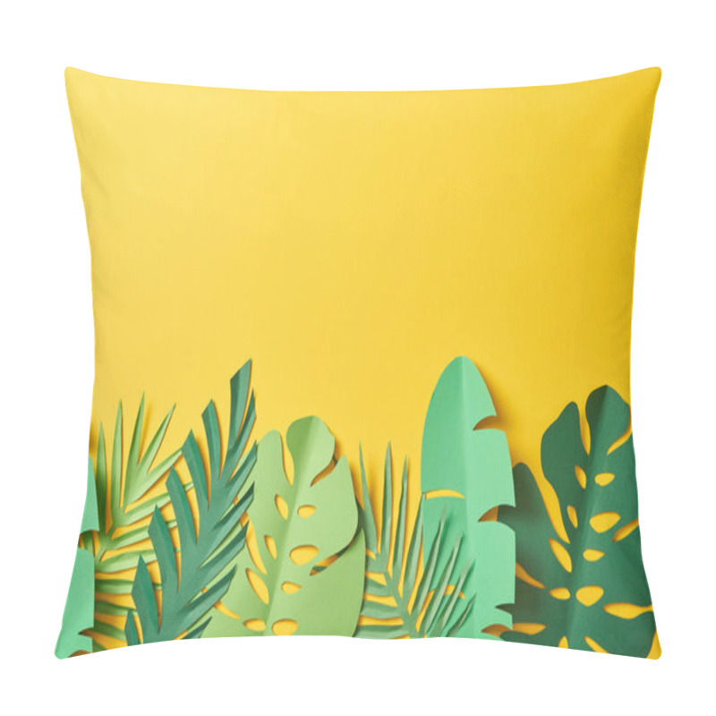 Personality  top view of paper cut green palm leaves on yellow background with copy space pillow covers