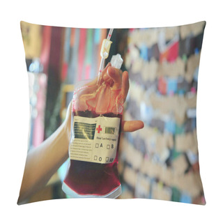 Personality  A Customer Displays A Red Beverage Served In A Blood Pack At A Vampire-inspired Cafe In Benxi City, Northeast Chinas Liaoning Province, 6 July 2014 Pillow Covers