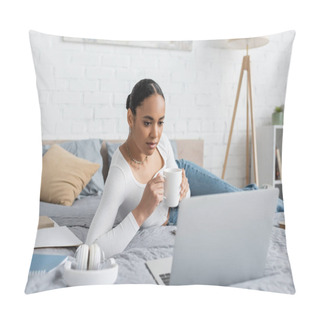 Personality  Young African American Student Holding Cup Of Coffee And Looking At Laptop In Modern Bedroom  Pillow Covers