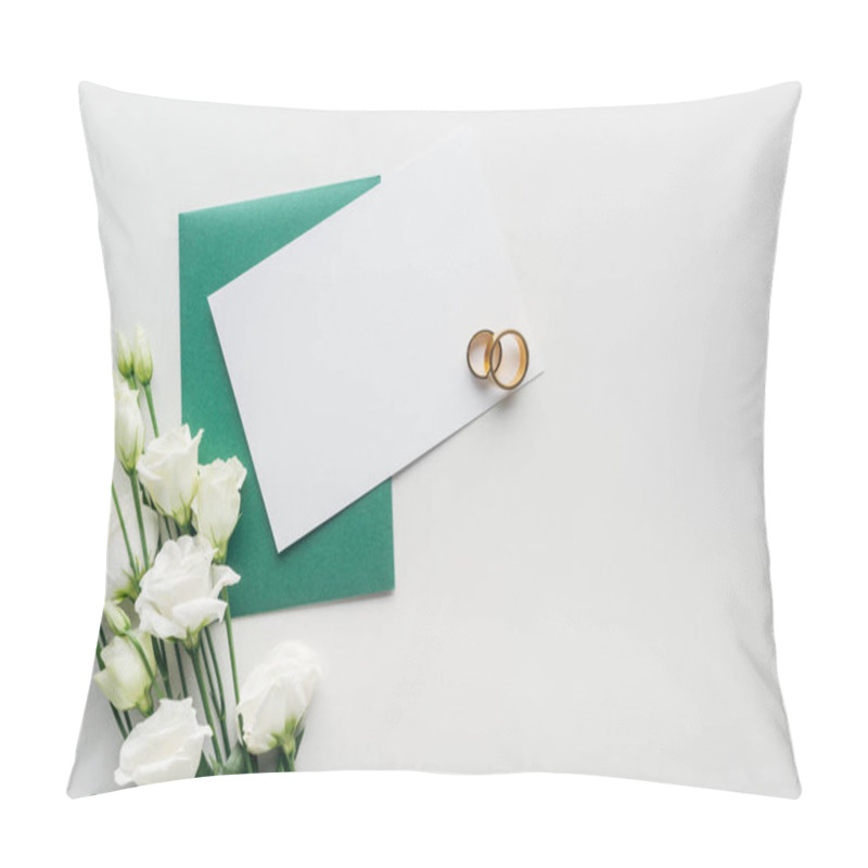 Personality  top view of empty card with green envelope, flowers and golden wedding rings on grey background pillow covers